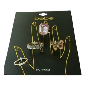NWT-BEBE-4 PIECE RING SET